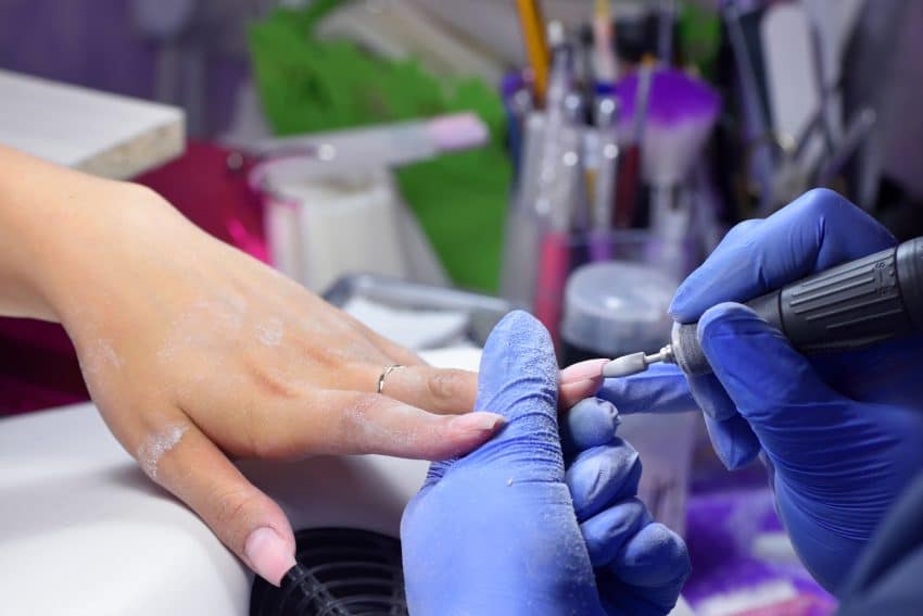 The Manicurist Grinded The Nails Of The Girl In The Nail Salon acrylnagels gellak acryl